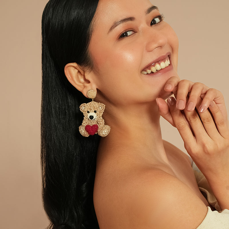 Model wearing Deepa Gurnani Teddy Earrings 