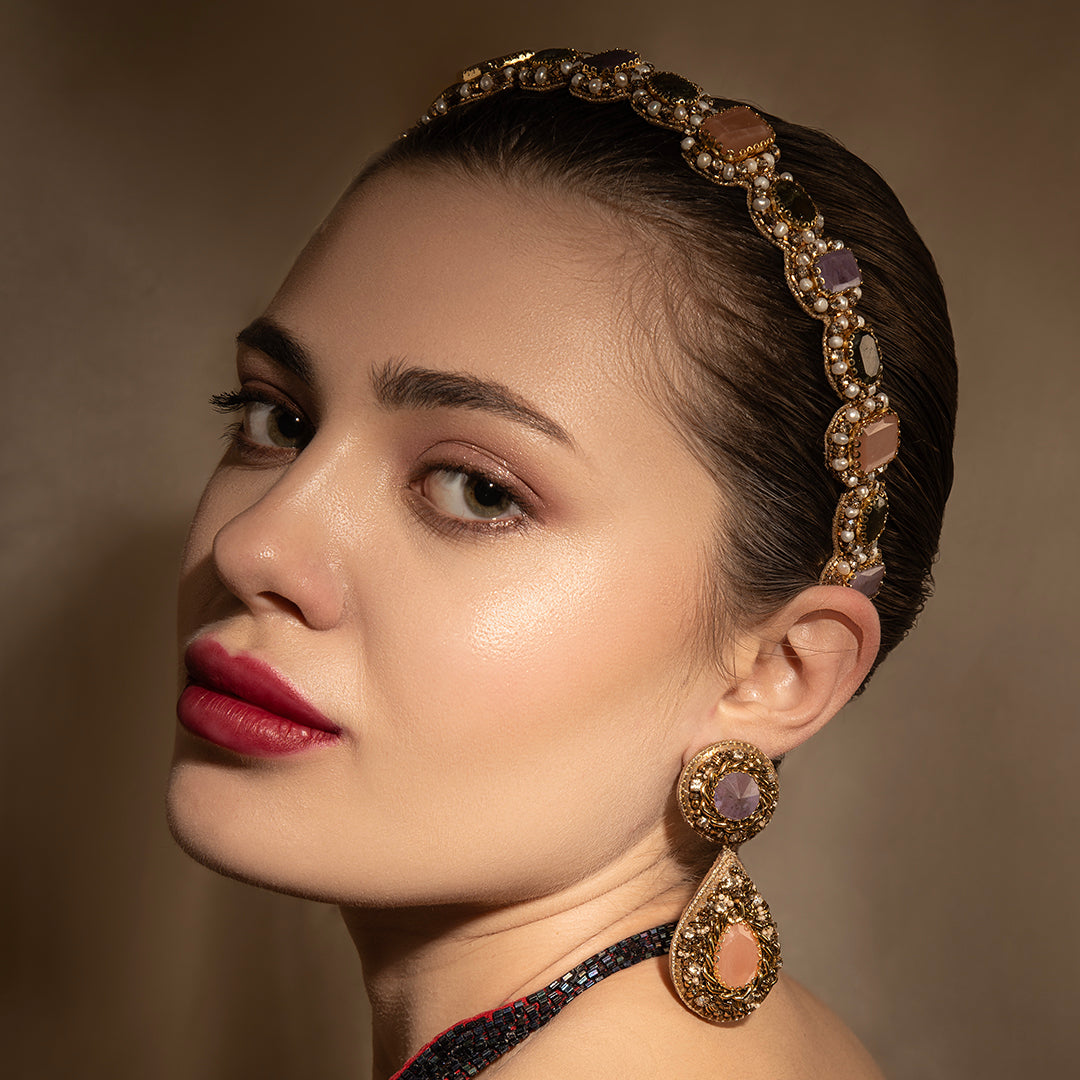 Model wearing handmade luxury Charlene Headband