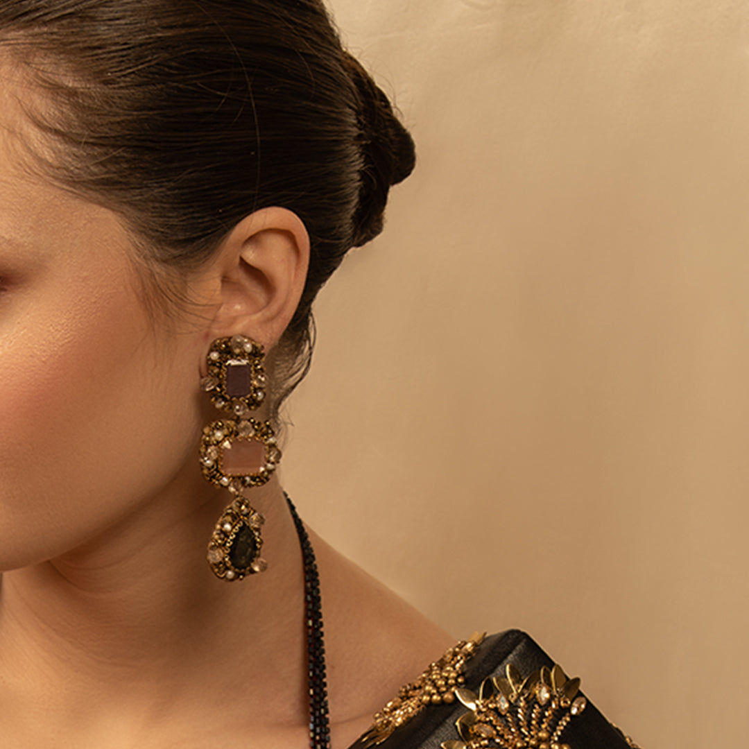 Model wearing handmade luxury Sibylla Earrings