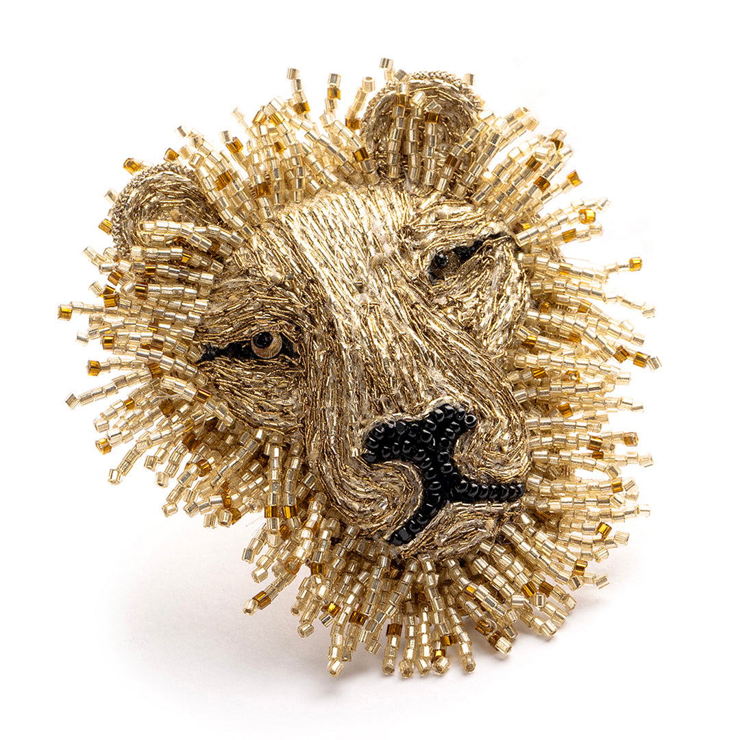 Detail of Deepa Gurnani handmade Lion brooch in gold color