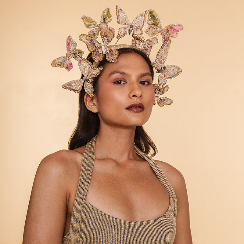 Model wearing Deepa Gurnani handmade the Monarch headband in Beige color