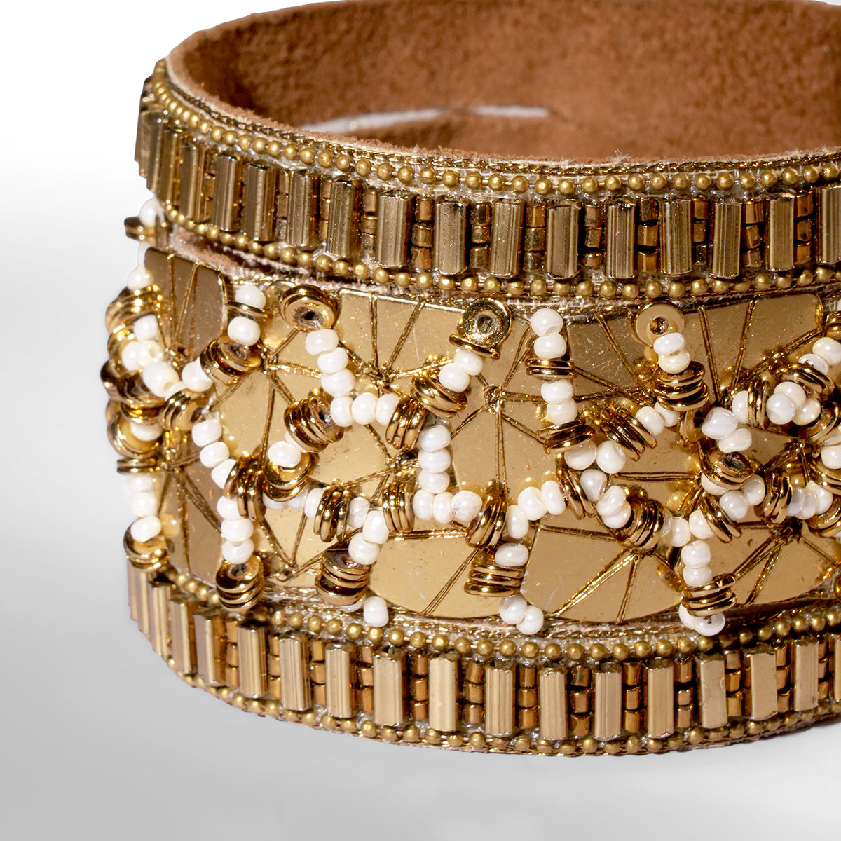 Close up of Deepa Gurnani Pret Lumis Bracelet in gold color
