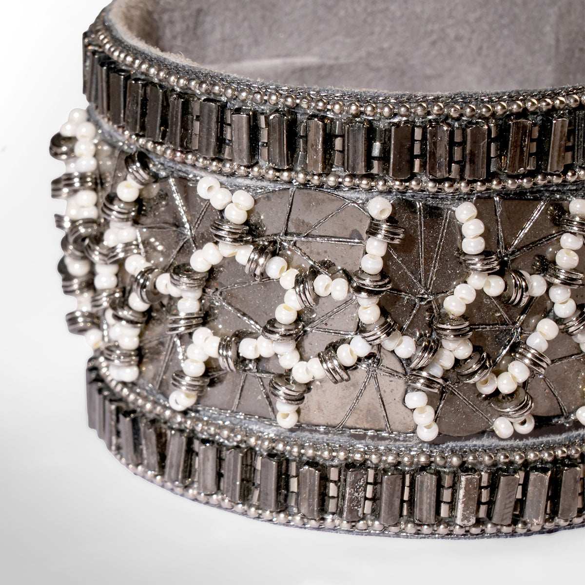 Close up of Deepa Gurnani Pret Lumis Bracelet in gunmetal color
