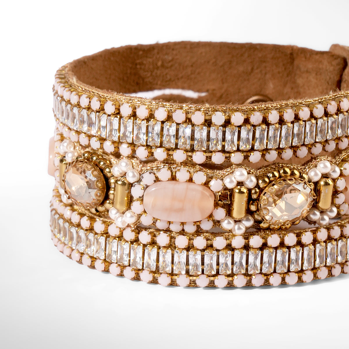 Close up of Deepa Gurnani Pret Harva Bracelet in peach color