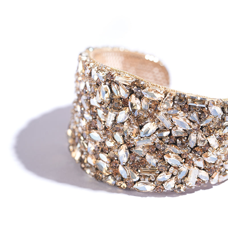 Detail of Deepa Gurnani Handmade Karen Cuff in gold color