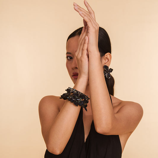 Model wearing  Deepa Gurnani Handmade Sirius Cuff in Black color