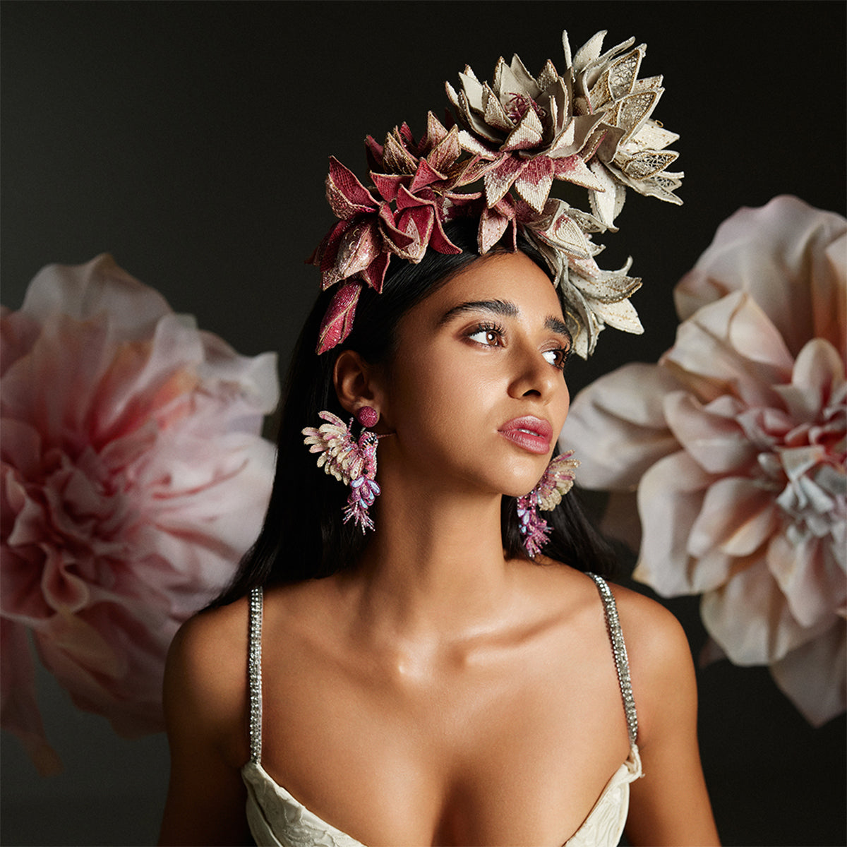 Model wearing handmade luxury Hummingbird Earrings