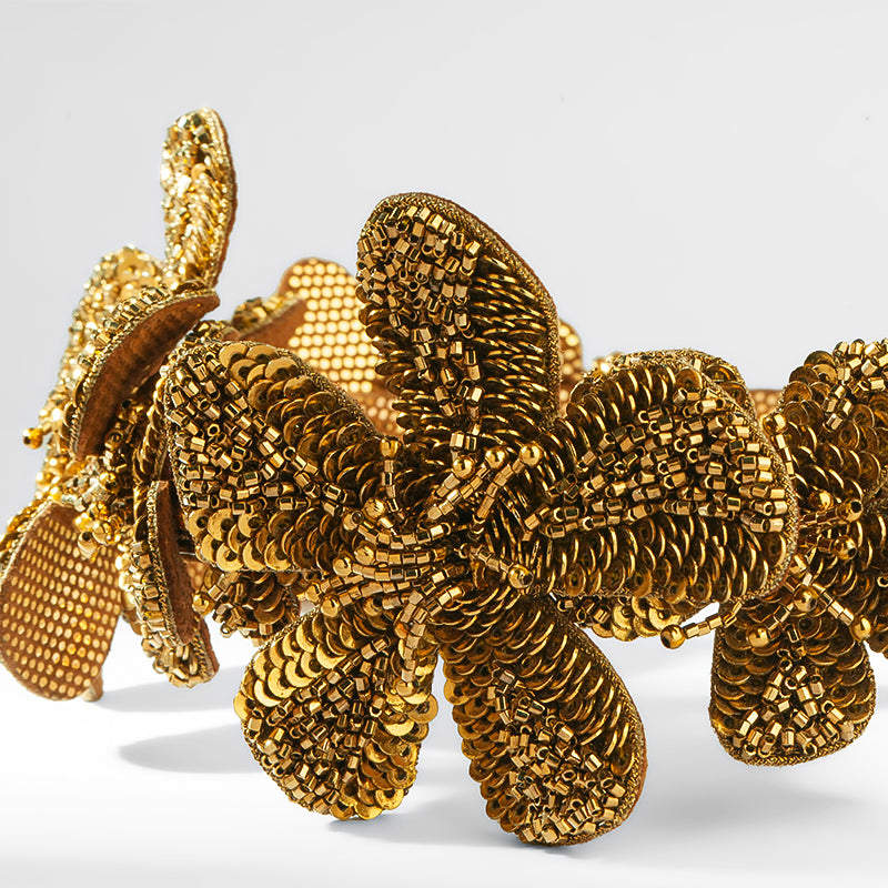 Close up of Deepa Gurnani Regina Headband in Gold Color 