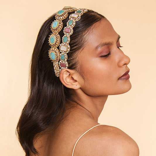 Model wearing Deepa Gurnani handmade the Charlene headband in Turquoise color