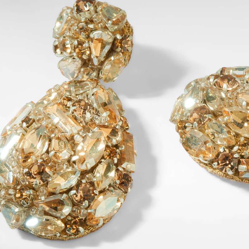 Close up of Deepa Gurnani Kim Earrings in Gold color 