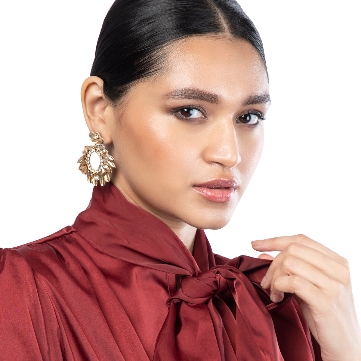 Model wearing Deepa By Deepa Gurnani Zienna Earrings in Gold color