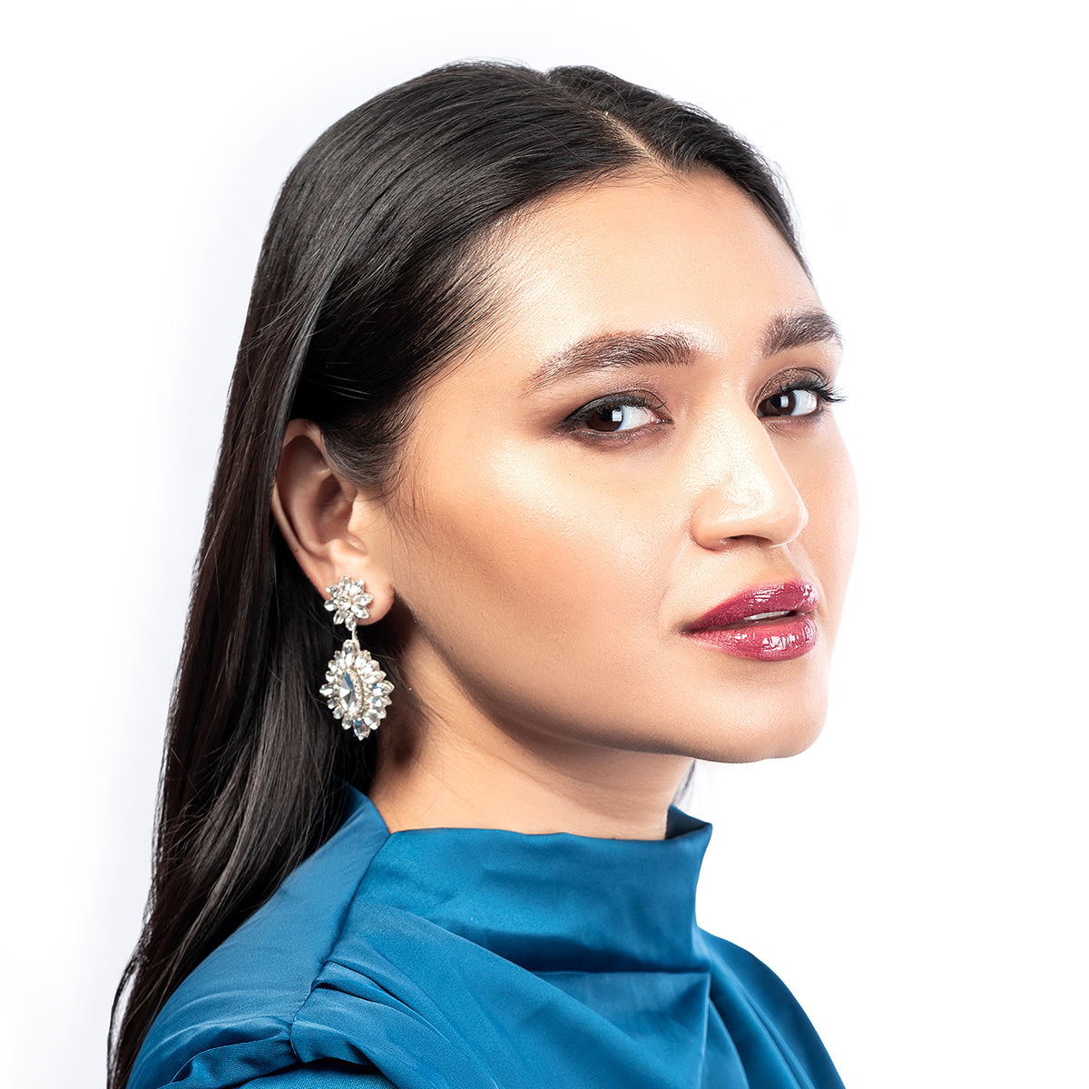 Model wearing Deepa By Deepa Gurnani handmade Alianah Earrings in silver color