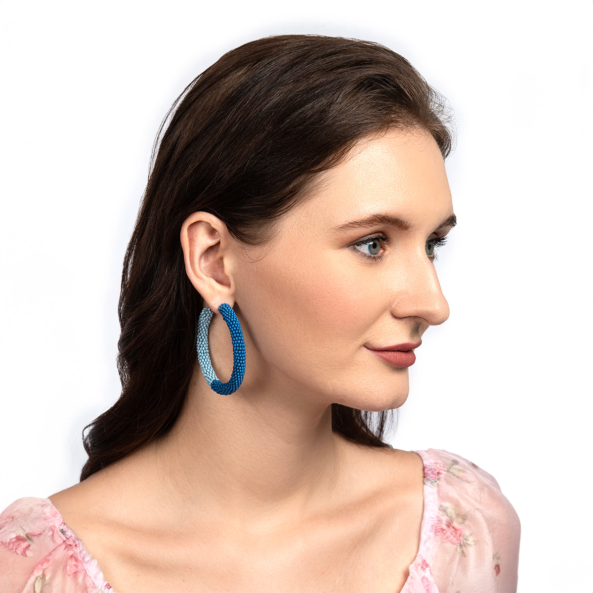 Model wearing Deepa By Deepa Gurnani handmade Nixie Earrings in baby blue color