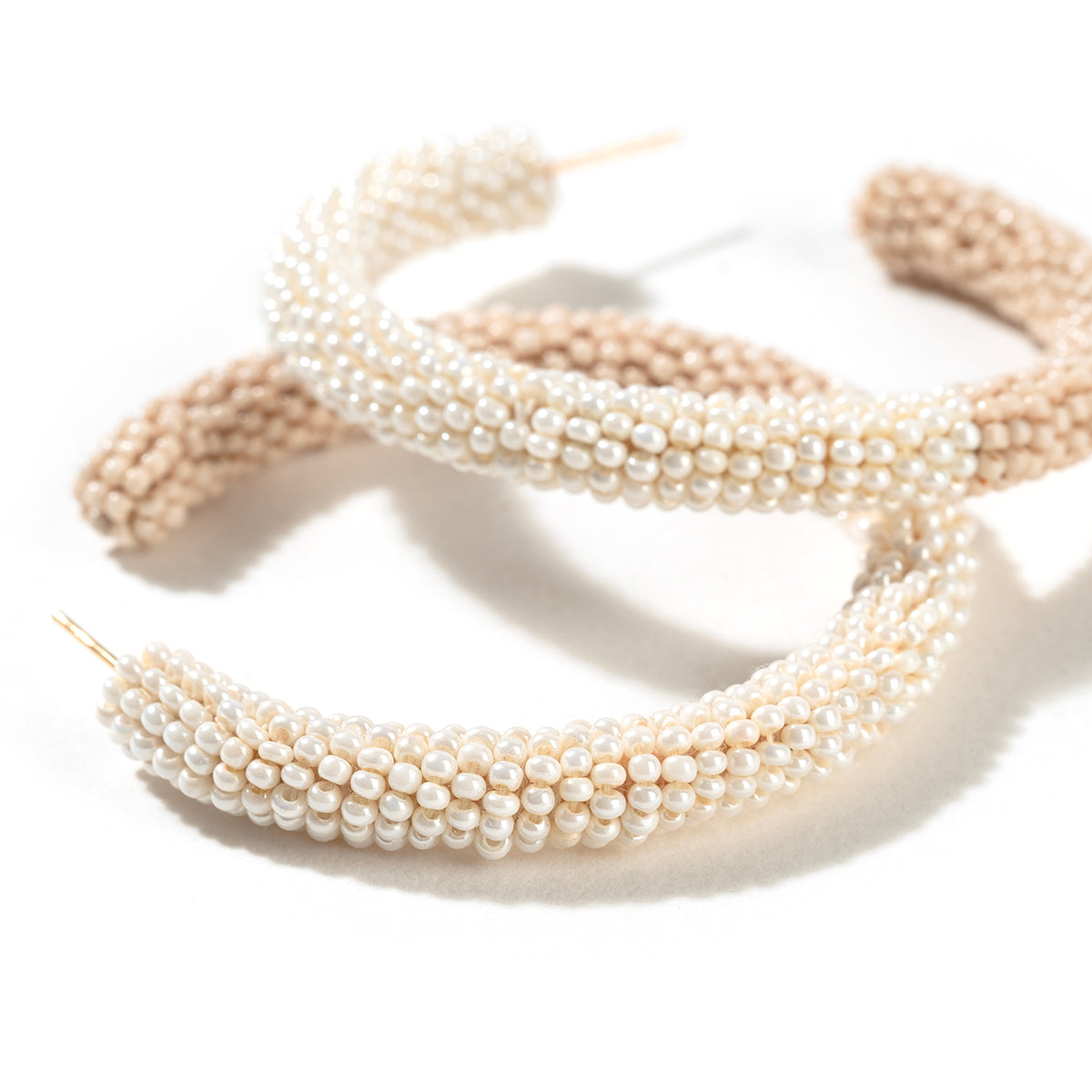 Detail of Deepa By Deepa Gurnani handmade Nixie Earrings in champagne color