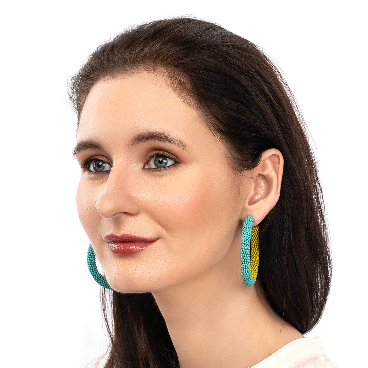 Model wearing Deepa By Deepa Gurnani handmade Nixie Earrings in chartreuse color