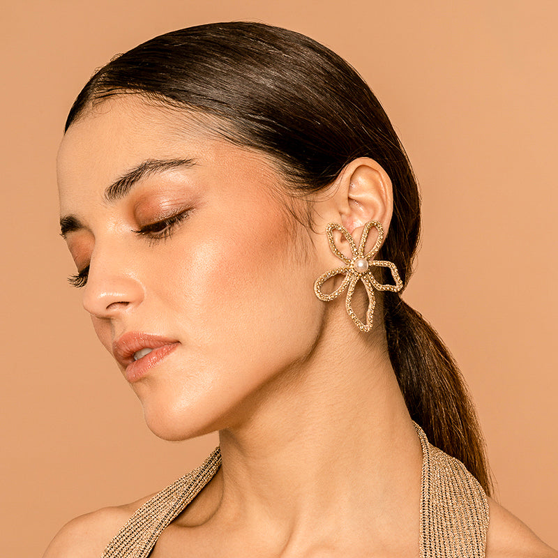 Model wearing our Deepa by Deepa Gurnani Handmade Felicity Earrings in Gold color