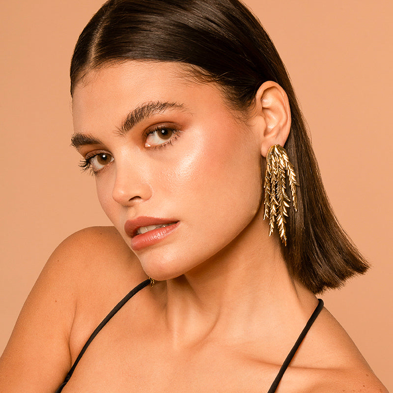 Model wearing Deepa by Deepa Gurnani Handmade Morrigan Earrings In Gold Color