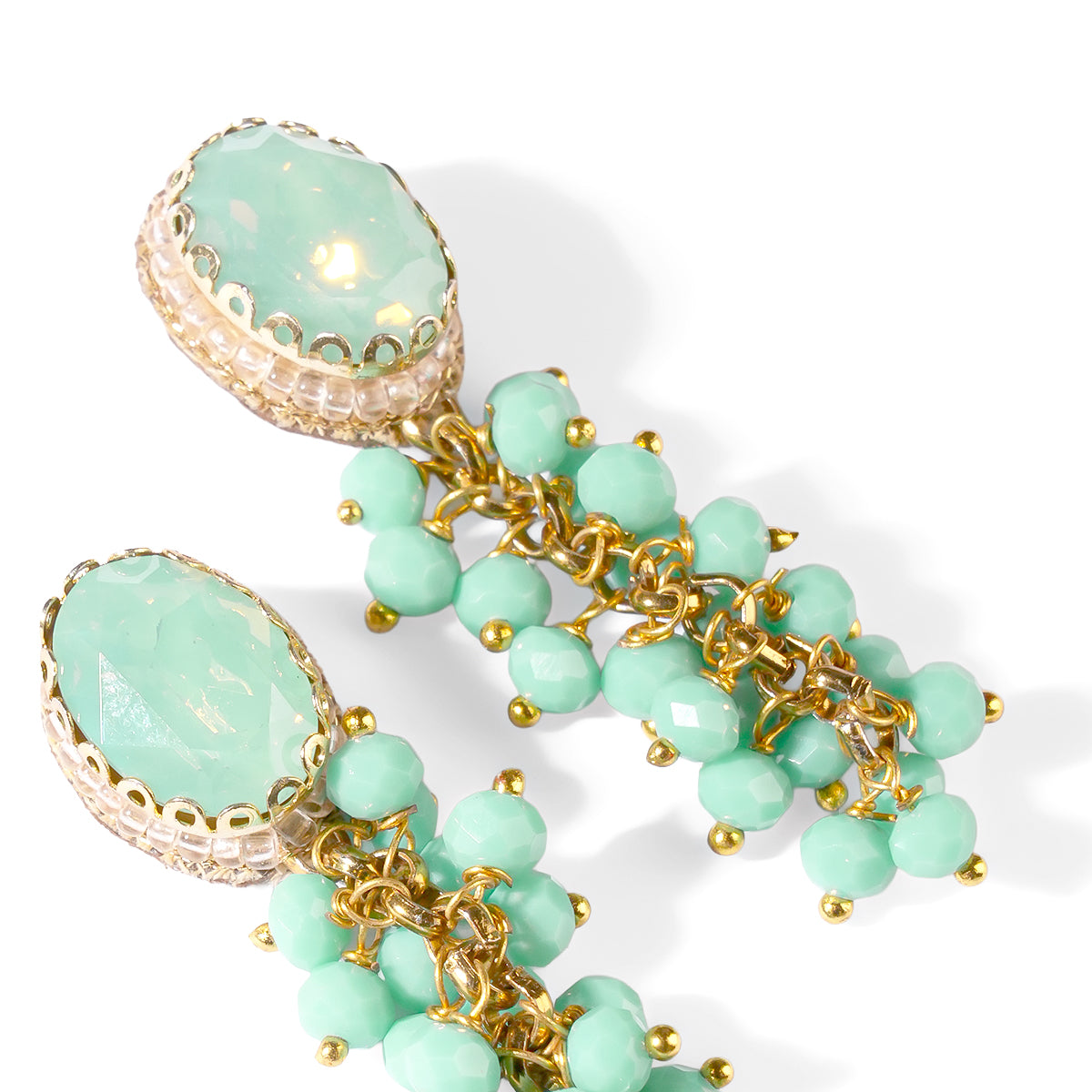 Close up of Deepa Gurnani Pret Jemsa Earrings in Turquoise color