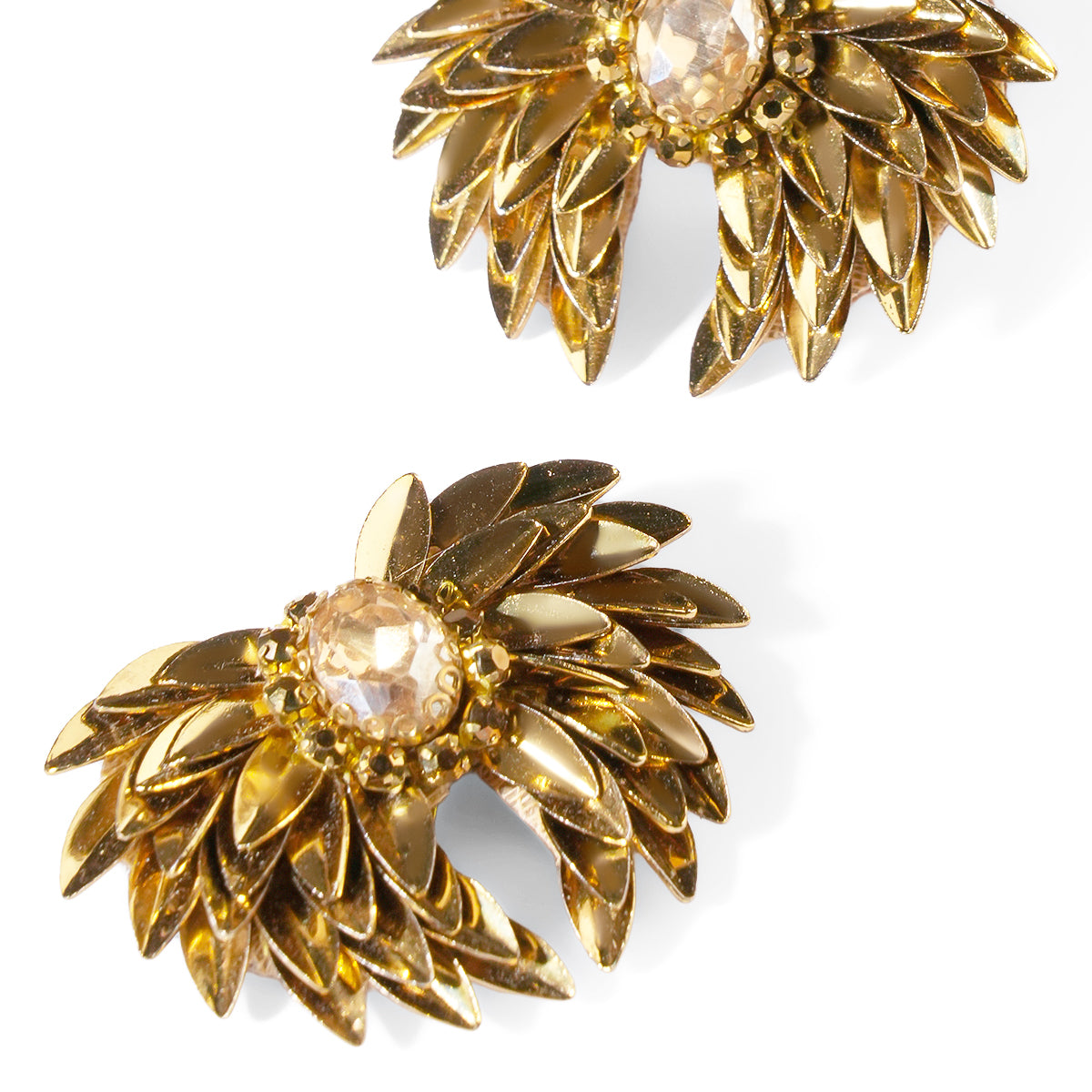 Close up of Deepa Gurnani Pret Ottie Earrings in Gold color