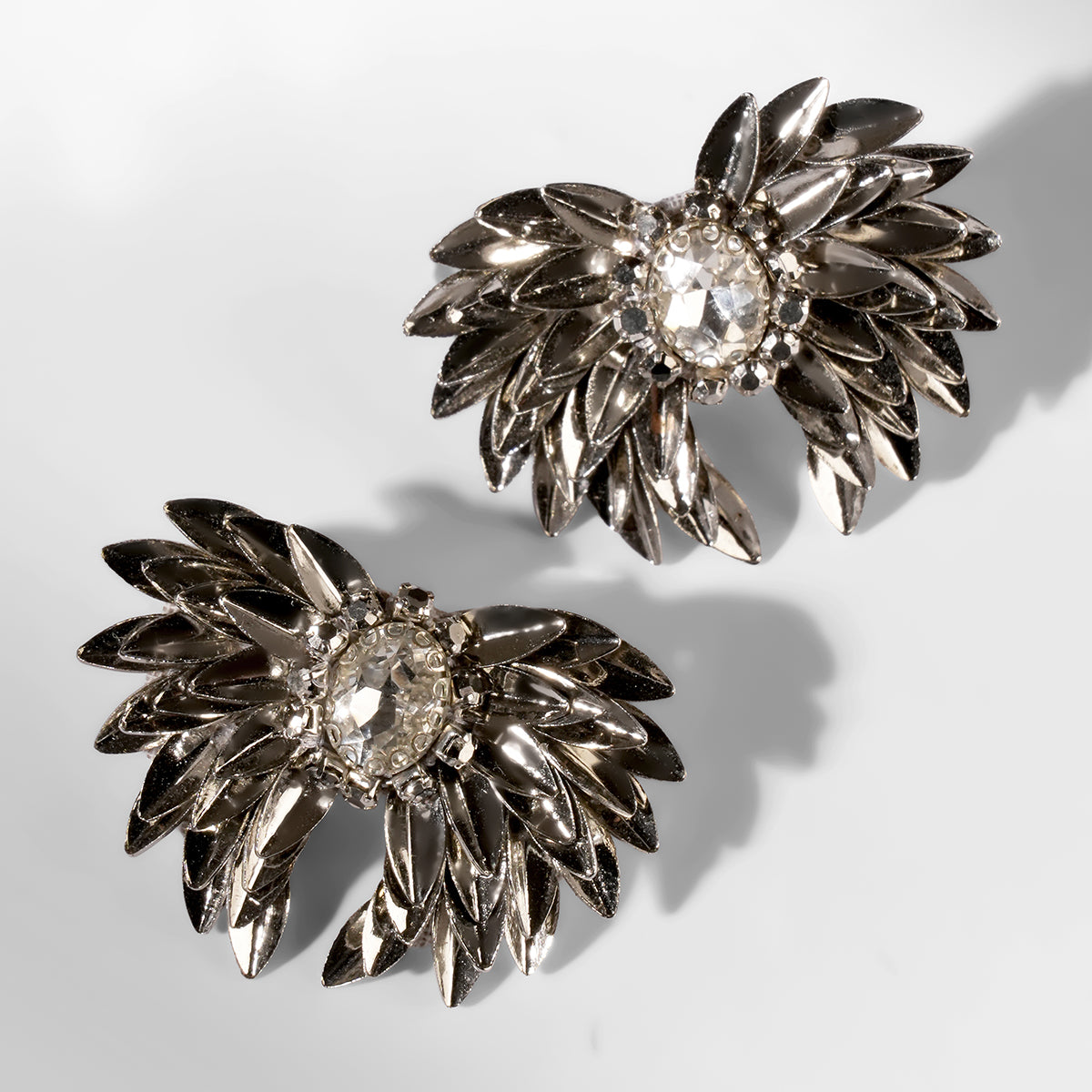 Deepa Gurnani Pret Ottie Earrings in gunmetal color