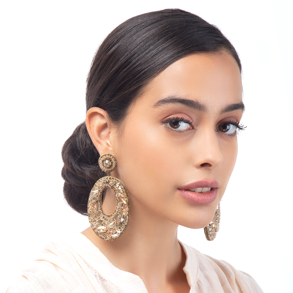 Model wearing large oval crystal post Lainey Earrings