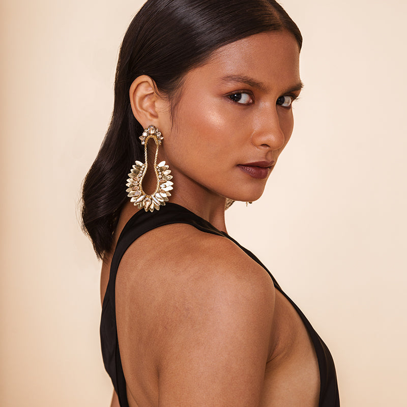 Model wearing Deepa Gurnani Handmade Nior Earrings Gold