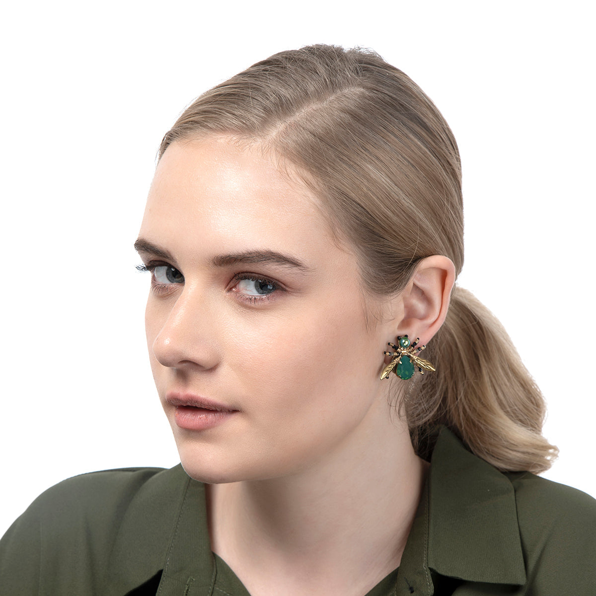 Model wearing Deepa Gurnani Firefly Earrings in Green colour