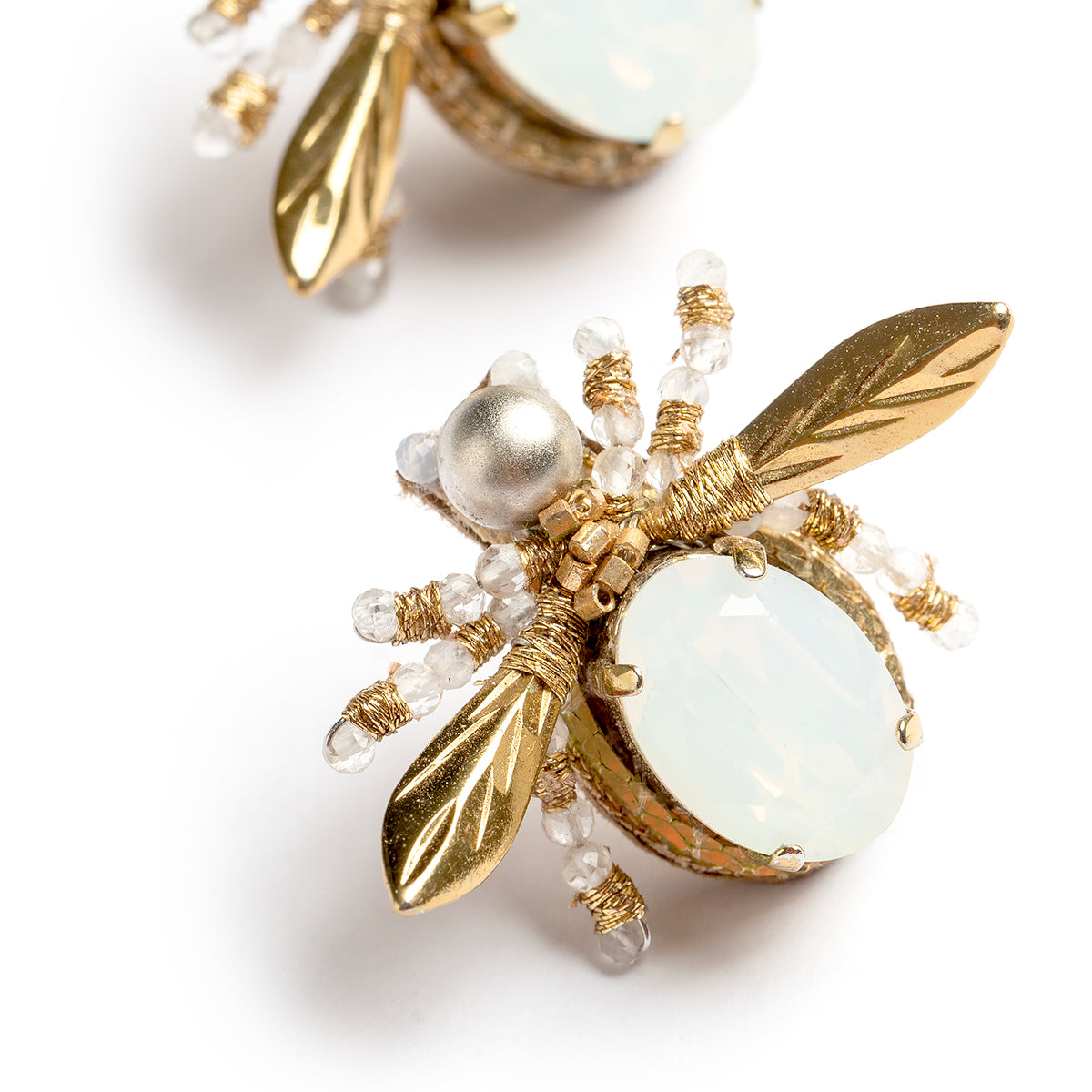 Detail of Deepa Gurnani handmade the Firefly earrings in opal color