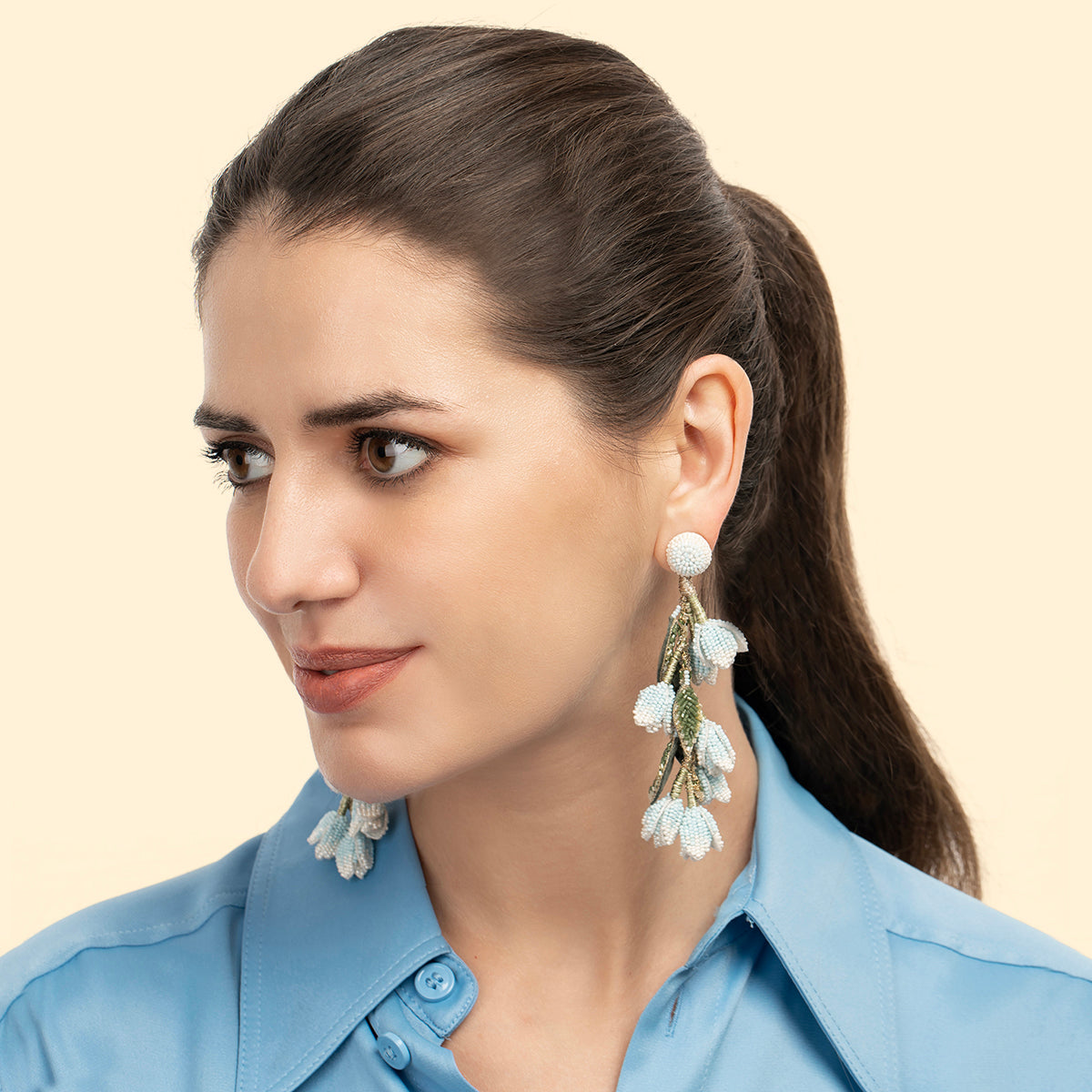 Model wearing handmade luxury Madelief Earrings