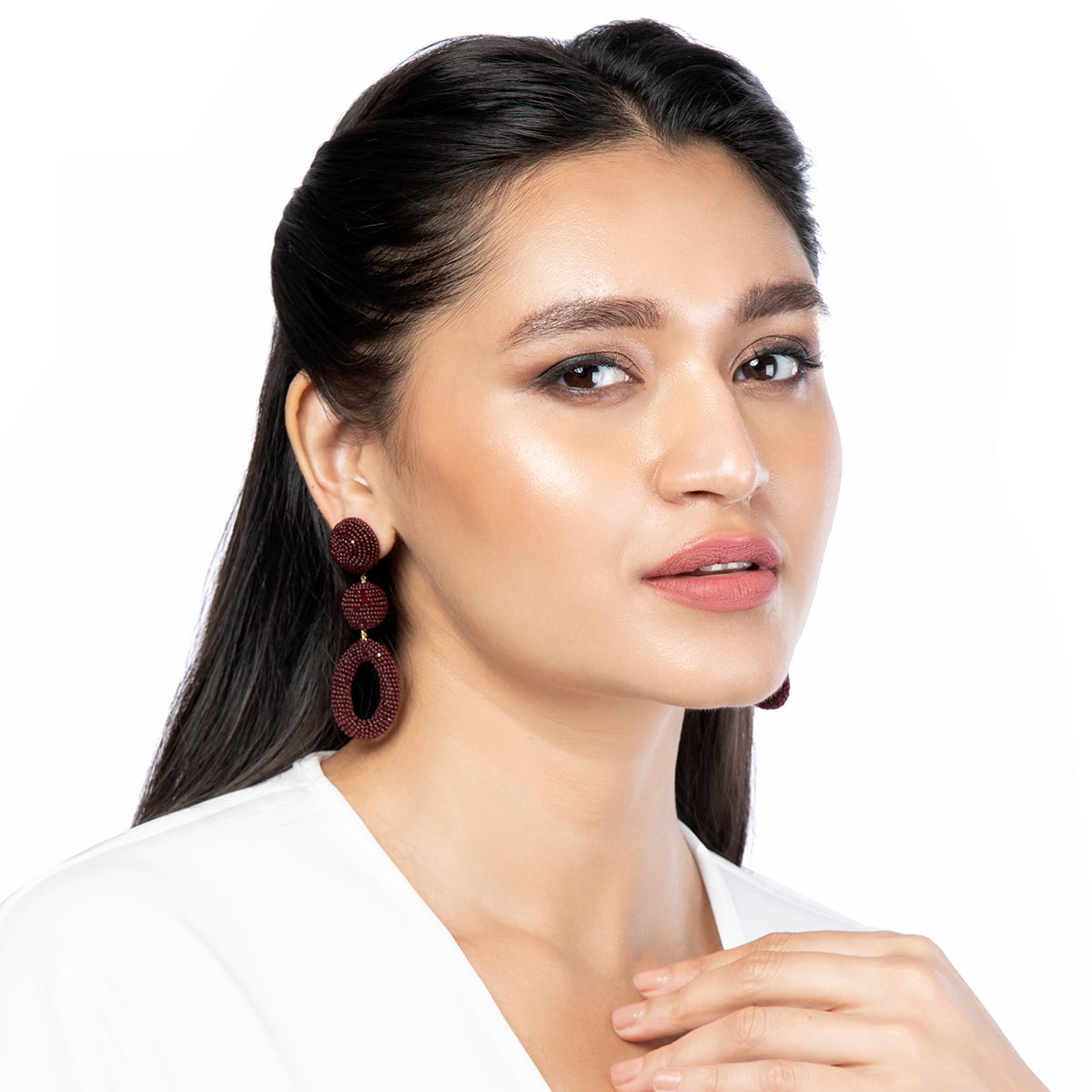 Model Wearing Deepa Gurnani Handmade Laylin Earrings in Maroon color