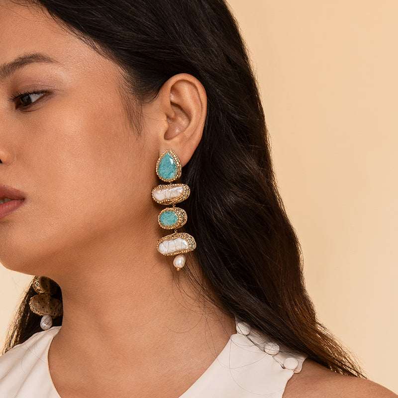 Model wearing Deepa Gurnani Handmade Nadira Earrings in Turquoise color