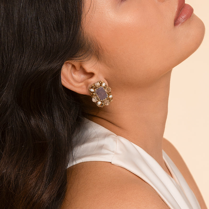 Model wearing Deepa Gurnani Handmade Moora Earrings in Lavender color