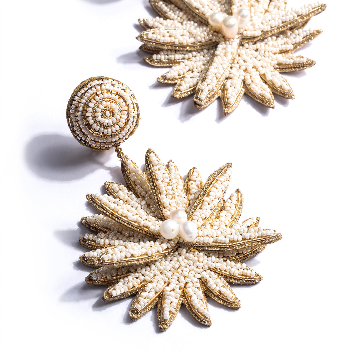 Detail of Deepa Gurnani handmade the Tallulah earrings in ivory color