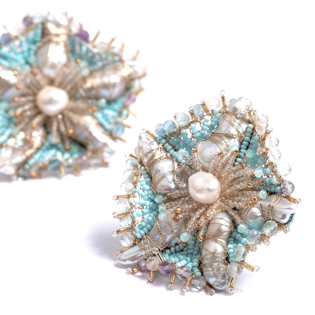 Detail of Deepa Gurnani handmade the Andrena earring in baby blue color