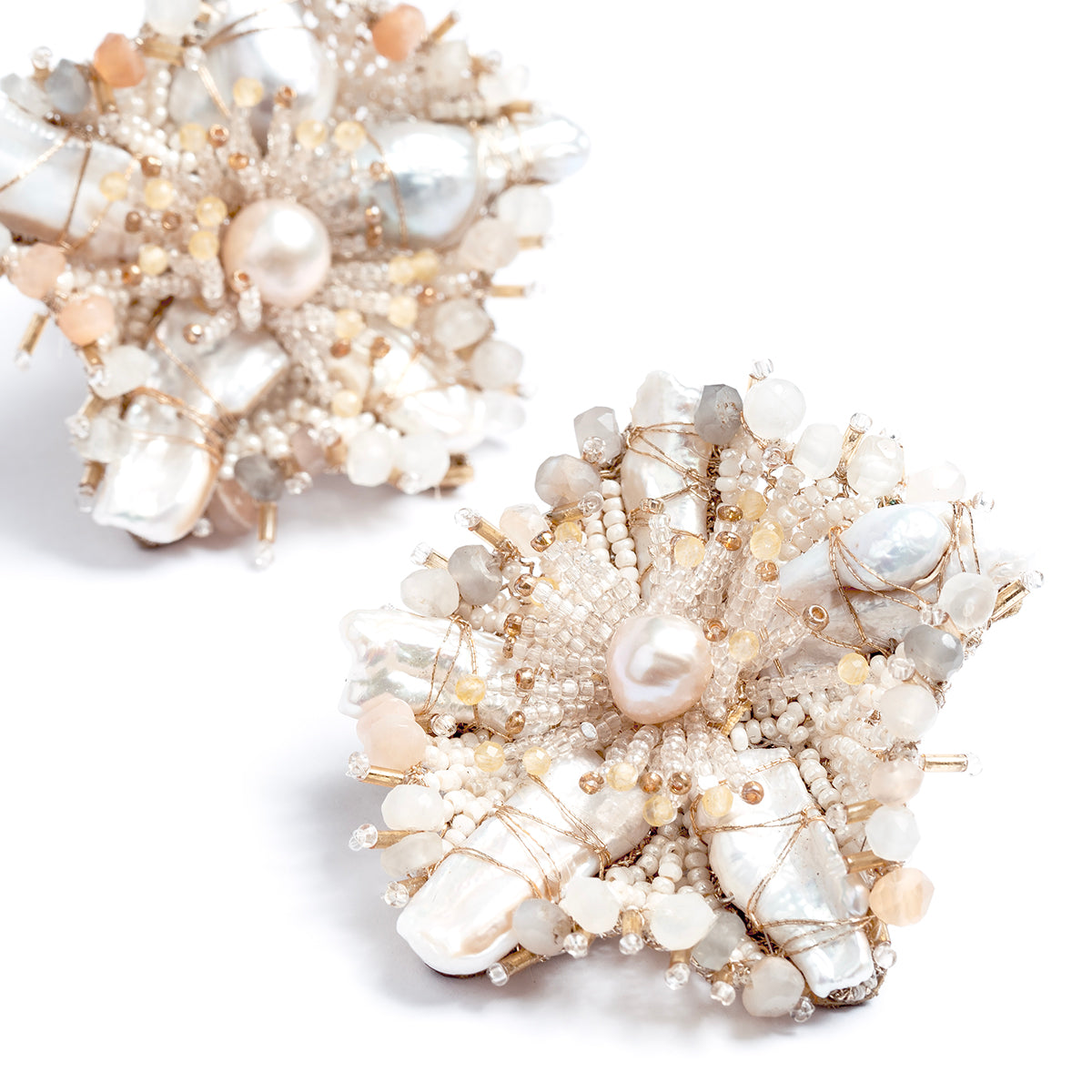 Detail of Deepa Gurnani handmade the Andrena earring in ivory color