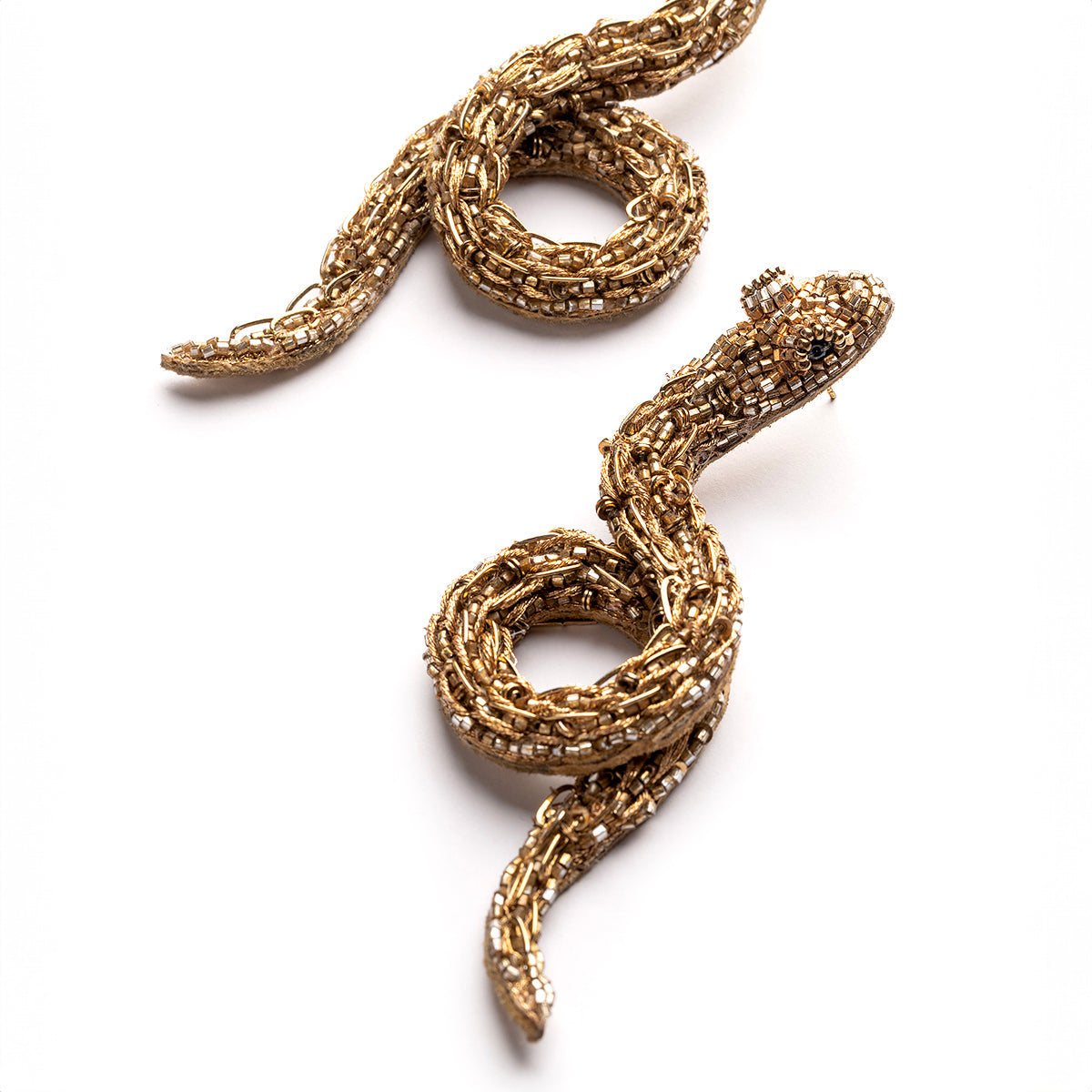 Detail of Deepa Gurnani handmade the Boa earrings in gold color