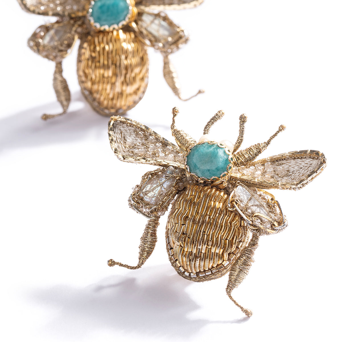 Detail of Deepa Gurnani handmade the Scarab earring in gold color