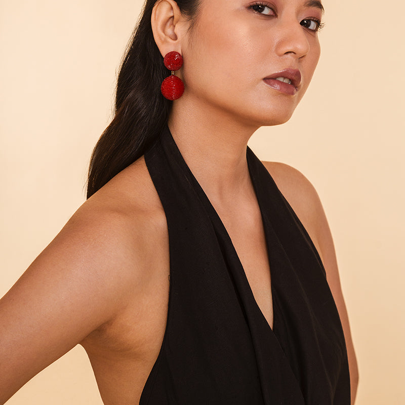 Model wearing our Deepa Gurnani handmade the Nica earring in Maroon color