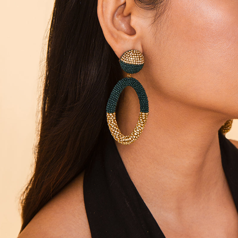 Model wearing Deepa Gurnani handmade Lorette Earrings in Green color