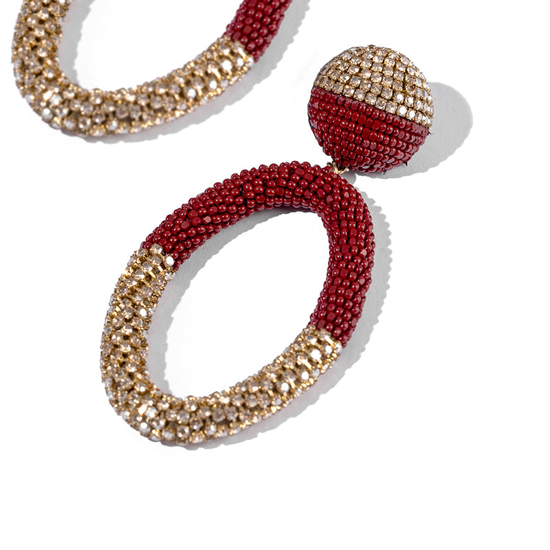 Detail of Deepa Gurnani handmade Lorette Earrings in Maroon color