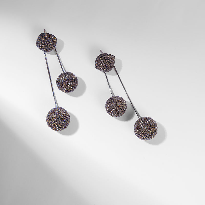 Deepa Gurnani handmade the Taryn earring in Gunmetal color