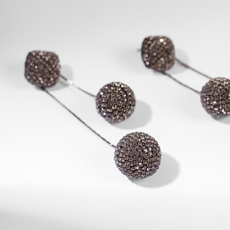 Detail of Deepa Gurnani handmade the Taryn earring in Gunmetal color