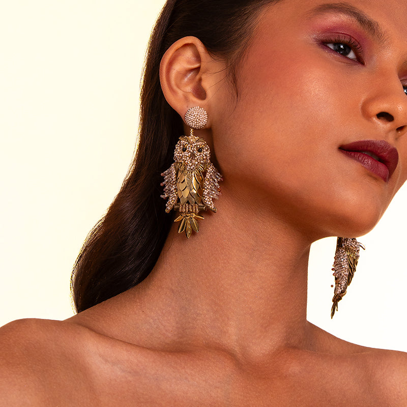 Model Wearing Deepa Gurnani handmade the Tawny earrings in Gold color.