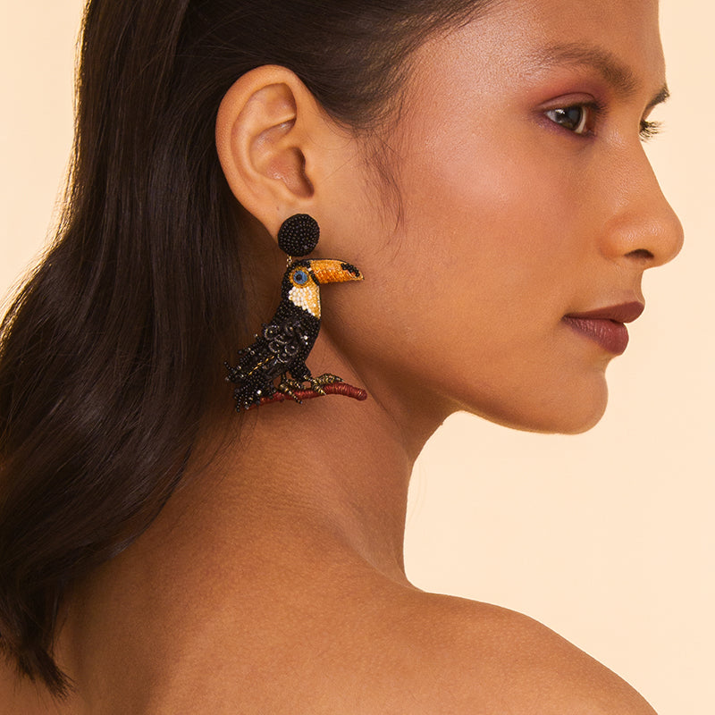 Model wearing Deepa Gurnani handmade the Toucan earrings in Black color.