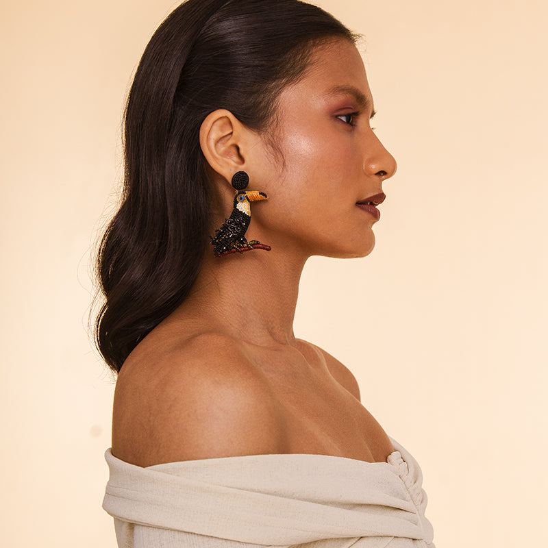 Model wearing Deepa Gurnani handmade the Toucan earrings in Black color.