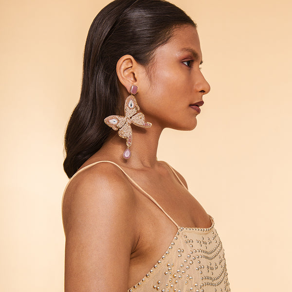 Model wearing Deepa Gurnani Handmade Ilona Earrings in Beige color