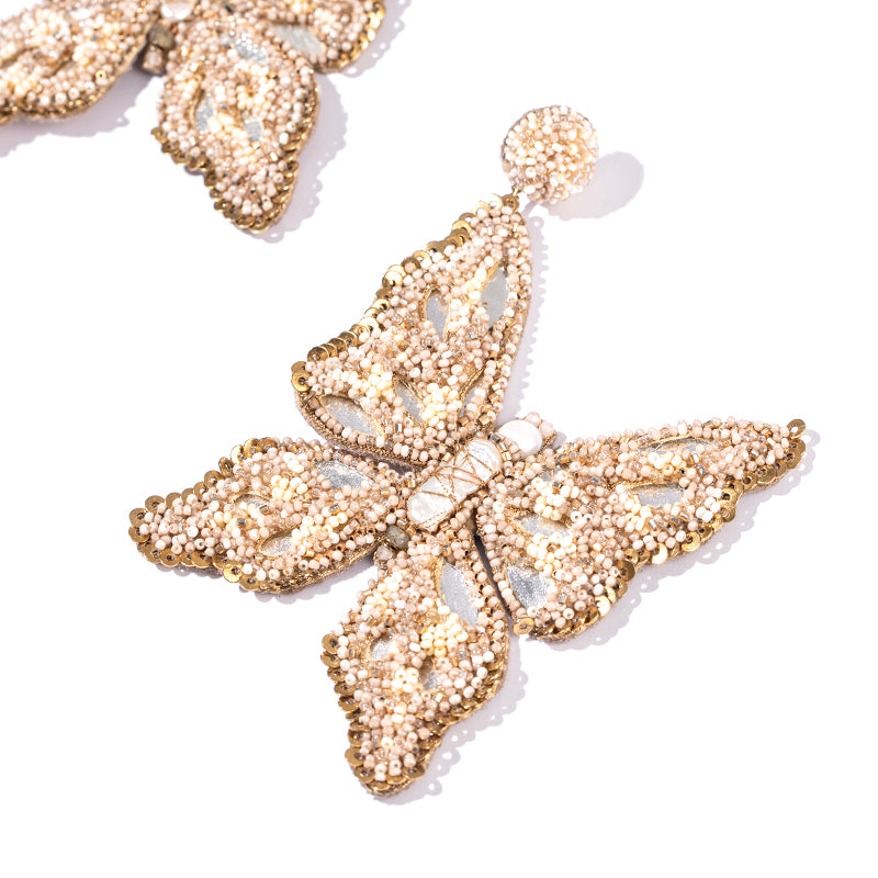 Detail of Deepa Gurnani Handmade Bruna Earrings in Beige color