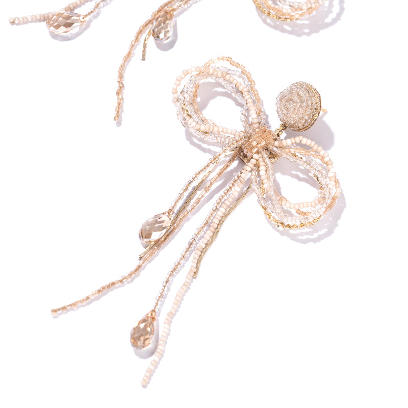 Detail of  Deepa Gurnani Handmade Coquette Earrings in Champagne