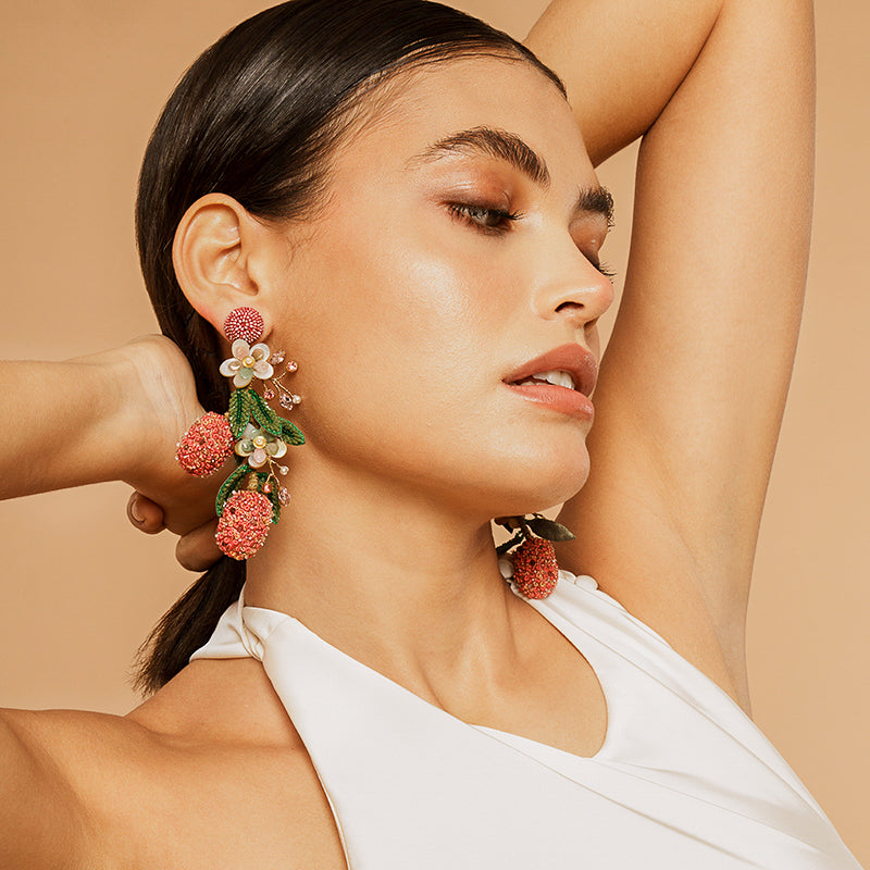 Model Wearing Deepa Gurnani handmade Lychee Earrings in Pink color