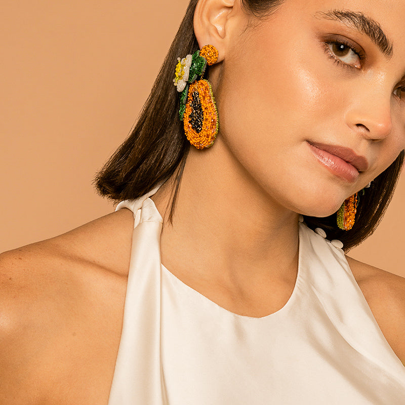 Model Wearing Deepa Gurnani handmade Papaya Earrings in Orange color